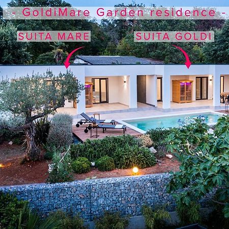 Goldimare Garden Residence อูมัค ภายนอก รูปภาพ